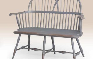 Historical Chesapeake Settee with double arched back in historical Williamsburg blue over red finish.