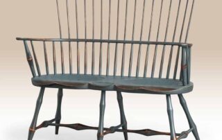 Historical Maryland Windsor Bench with bamboo style turnings, carved ears, and shaped seat in historical salt box blue over natural.