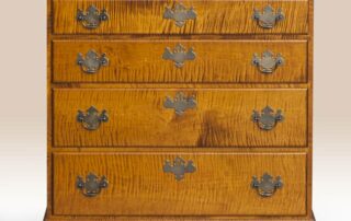 MA Four Drawer Chest of Drawers with dovetailed joints, ogee feet, and classic Chippendale design, available in tiger maple or cherry.