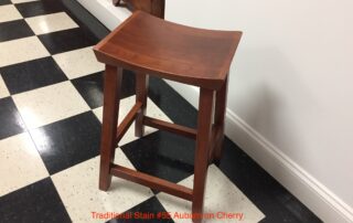 Soho Stool with a simple wood seat design, ideal for modern settings or city apartments. Available in two heights.