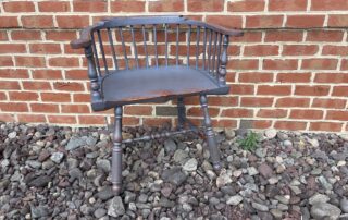 Painted Historical Philadelphia Windsor Armchair in Williamsburg blue over red finish, ideal for period decor, American made.