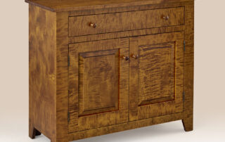 Canterbury Sideboard with simple Shaker design, dovetailed drawer, and wooden pulls, available in tiger maple, cherry, or painted finishes. American made.