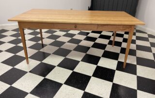 Cherry Wood 6ft X 36in Shaker Table with natural lacquer finish, dovetailed drawer, and walnut drawer pull.