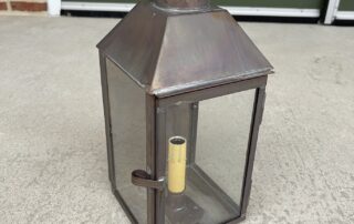 Barnstable Wall Light in dark brass finish, ideal for country, colonial, and contemporary home styles.