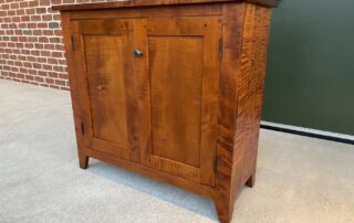 Historical Dusing Bookcase in tiger maple wood, ideal for versatile storage in multiple settings, American made.