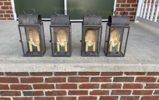 Set of Four Large Asheville Wall Lights in dark brass, American-made, ideal for country, colonial, or contemporary decor.