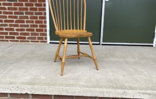 Historical Bow Back Side Windsor Chair with comb and bamboo-style turnings, mustard over red finish, American made.