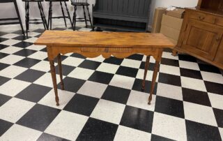 Tiger Maple Hall Table with turned legs, scalloped skirt, and dovetailed drawer. Perfect for hallways or behind sofas. American made.