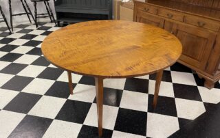 48in Round Shaker Table in Tiger Maple Wood, ideal for Shaker, Designer, or City Apartment settings.