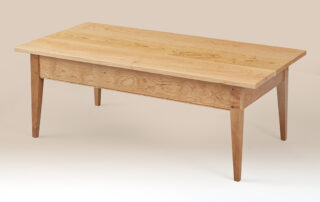 Pleasant Hill Shaker Coffee Table with tapered legs in natural cherry wood, part of the New Shaker Designer Series.