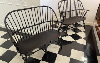 Pair of Sack Back Windsor Settees, ideal for hallways, foyers, or living rooms. Timeless design and American made.