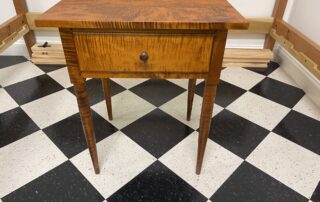 Tiger Maple Shaker Style Stand with simple turned legs, dovetailed drawer, and walnut drawer pull. Ideal for Shaker and designer interiors.