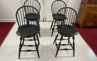 Set of Four Historical Swivel Low Bow Back Windsor Stools in Antique Black over Red Crackle Finish – American Made