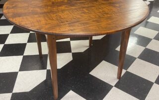 48in Round Shaker Style Table with tiger maple wood top and tapered legs, crafted in Pennsylvania, perfect for Shaker and country-style decor.