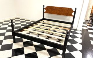 American Made Queen Size Low Poster Bed with tiger maple headboard, thistle motif on turned posts, and antique black over red crackle frame.