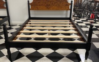 Made in USA Queen Size Cannonball Bed with tiger maple headboard and antique black over red crackle frame.