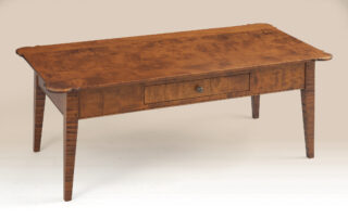 Shaker Coffee Table with Drawer in tiger maple wood, showcasing porringer ends and dovetailed drawer.