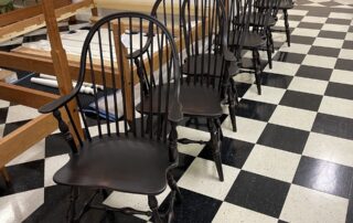 A set of 6 classic American-made Windsor chairs, including 2 Continuous Arm Windsor Armchairs and 4 Bow Back Side Windsor Chairs.