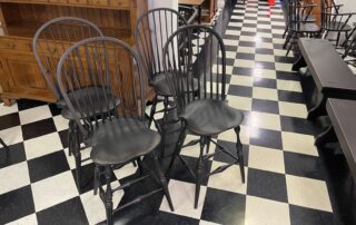 A set of 4 Non-Swivel Historical Bow Back Windsor Stools, expertly crafted with traditional woodworking techniques.