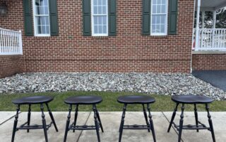 A set of four Windsor stools, expertly crafted in Pennsylvania, featuring classic Windsor style with a modern twist.