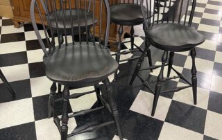 A set of 4 Swivel Historical Low Bow Back Windsor Stools, combining classic Windsor style with modern functionality.