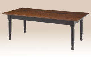 Gettysburg Farmhouse Table with hand-planed cherry wood top and antique black over red painted base, crafted in Pennsylvania.
