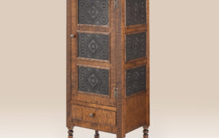 Grainger Pie Safe in tiger maple wood with punched tin panels and turned feet.