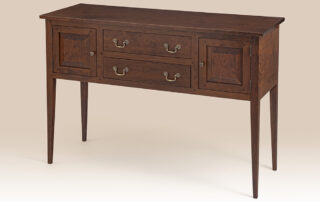 Historical Virginia Sideboard in cherry with tapered legs and dovetailed drawers.