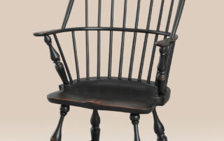 Historical Sack Back Windsor Armchair with Shield Seat, featuring a higher hoop, shield seat, and antique finish.