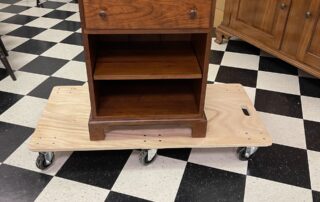 Cherry Shaker Style Stand with dovetailed drawer and interchangeable shelf, versatile for family or living rooms.