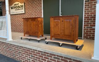 Classic Tiger Maple Wood Shaker Cabinets with raised panel doors and walnut door pulls, combining simplicity, functionality, and aesthetic charm. Ideal for any room, offering practical storage solutions.