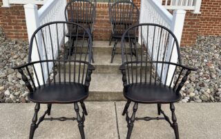 A collection of 6 Windsor chairs, including 2 Sack Back Windsor Armchairs and 4 Bow Back Side Windsor Chairs, crafted in Pennsylvania.