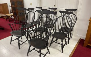 A set of 8 Pennsylvania-made Windsor chairs, including 2 Sack Back with Comb Windsor Armchairs and 6 Bow Back Windsor Side Chairs with Comb.