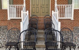 A set of 12 Jefferson Windsor chairs, including 2 armchairs and 10 side chairs, crafted in Pennsylvania.
