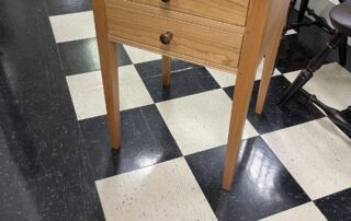 A Two Drawer Cherry Wood Shaker Stand, featuring a natural lacquer finish that highlights the beautiful graining of the wood.