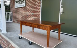 Tiger Maple Tapered Leg Coffee Table with tapered legs, tiger maple wood, and a walnut drawer pull. Ideal for Shaker-style living rooms.