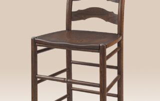 French Country Ladder Back Stool in oak finish with shaped back slats.
