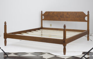 King Size American Made Bed in tiger maple with acorn motifs and low poster design.