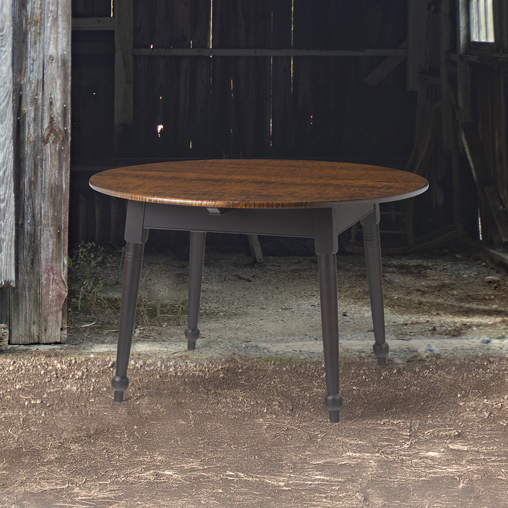 Round farmhouse tables with rustic finishes, perfect for kitchens or dining rooms. American-made and available in custom sizes.