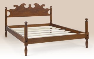 Historical Cape Cod Bed with a scalloped headboard, cannonball motif, and low poster design. Available in multiple wood and finish options.