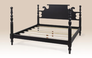 Historical Southampton Bell and Ball Bed with turned posts and rolling pin headboard. Shown in Antique Black over Red. Made in the USA.
