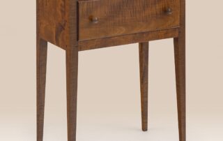 Shaker Server with dovetailed drawer, tapered legs, and a classic Shaker design. Available in Tiger Maple or Cherry Wood.