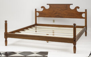 American Made King Size Cannonball Bed with rolling pin headboard and cannonball posts. Shown in tiger maple.
