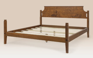 Historical Falmouth Bed with low poster frame and simple headboard in tiger maple. Made in the USA.