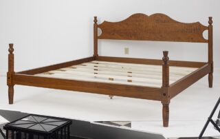 King Size Tiger Maple Country Low Poster Bed with shaped headboard and thistle finials.