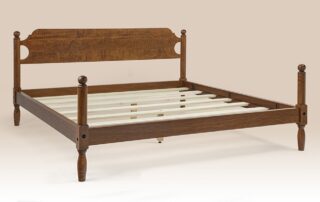 Tiger Maple Country Cottage Bed with cannonball motif and low poster frame.