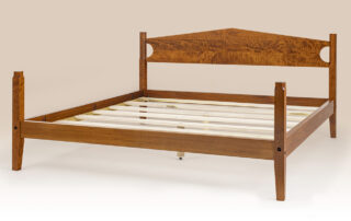 Historical Sandwich Low Poster Bed in tiger maple with low poster frame and Shaker-inspired design.