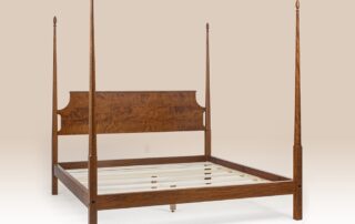 Historical Truro Pencil Post Bed in tiger maple with clean lines and pencil post design.