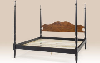 Historical Wellesley Poster Bed in tiger maple and painted frame with turned posts and shaped headboard.