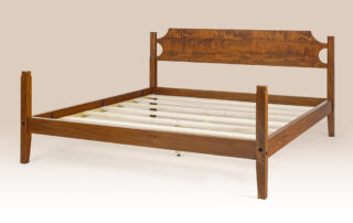 Historical Wellfleet Low Poster Bed in tiger maple with low posts and a simple Shaker-style headboard.